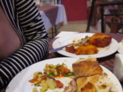 Downblouse, and stockings upskirt in a restaurant